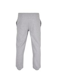 BUILD YOUR BRAND - Podstawowe Spodnie Dresowe Unisex Dla Dorosłych. Kolor: szary. Materiał: dresówka