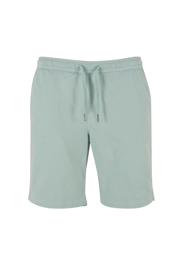 Urban Classics - Męskie Elastyczne Spodenki Dresowe Twill. Kolor: zielony. Materiał: dresówka. Sport: turystyka piesza