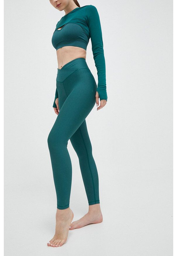CASALL - Casall legginsy do jogi kolor zielony gładkie. Kolor: zielony. Materiał: włókno, dzianina, materiał. Wzór: gładki. Sport: joga i pilates