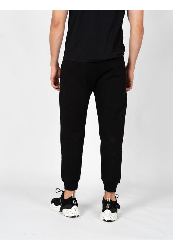 Les Hommes Spodnie "Jogging" | LBH4003700U | Mężczyzna | Czarny. Okazja: na co dzień. Kolor: czarny. Materiał: bawełna. Długość: długie. Styl: elegancki, casual