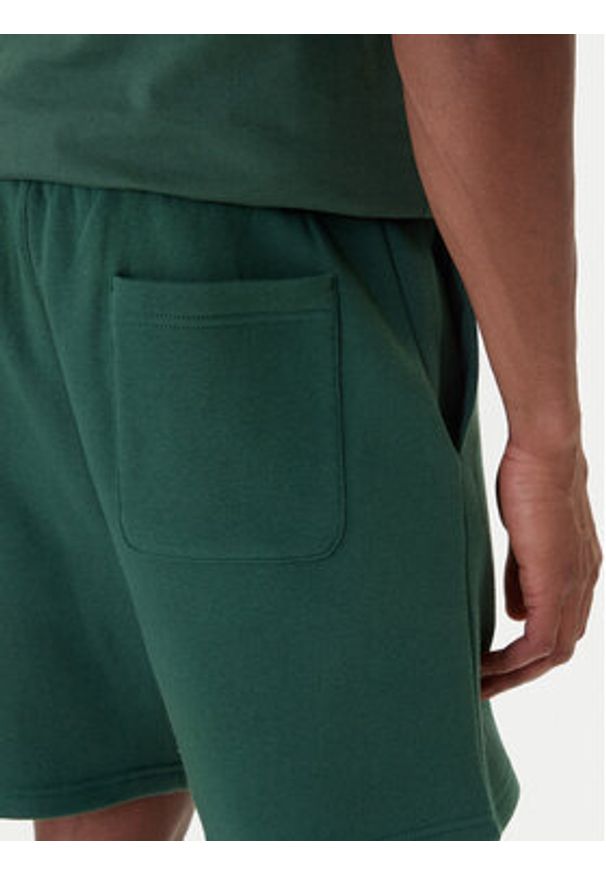 Tommy Jeans Szorty materiałowe DM0DM21931 Zielony Regular Fit. Kolor: zielony. Materiał: bawełna