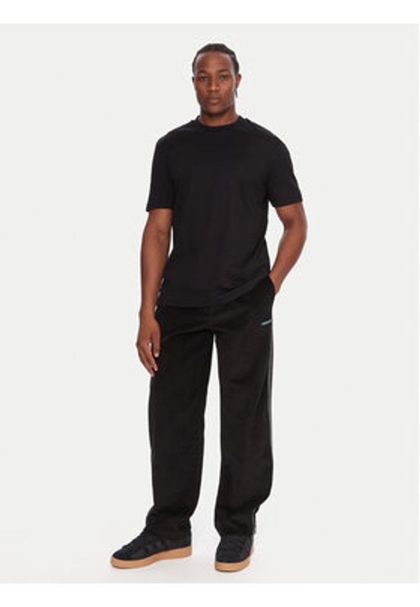 Adidas - adidas Spodnie dresowe Corduroy JX3107 Czarny Regular Fit. Kolor: czarny. Materiał: bawełna