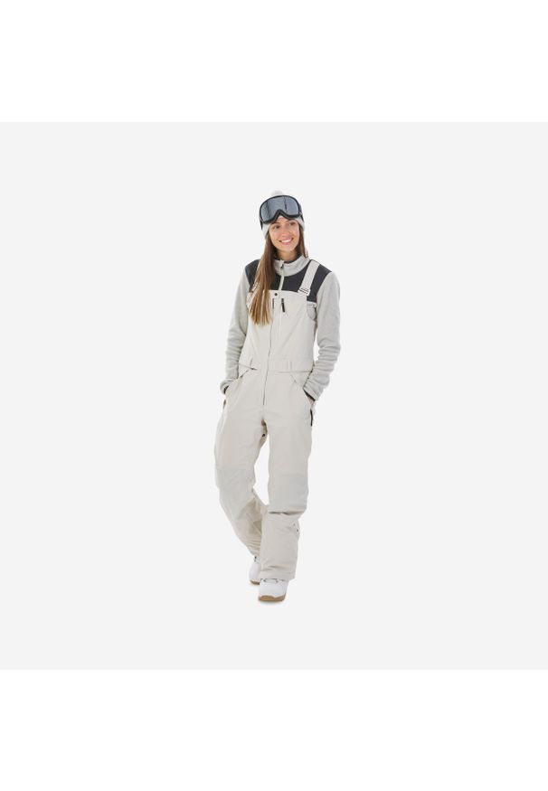 DREAMSCAPE - Spodnie snowboardowe ogrodniczki damskie Dreamscape SNB BIB 900. Kolor: beżowy. Materiał: polar, materiał. Sezon: zima. Sport: snowboard