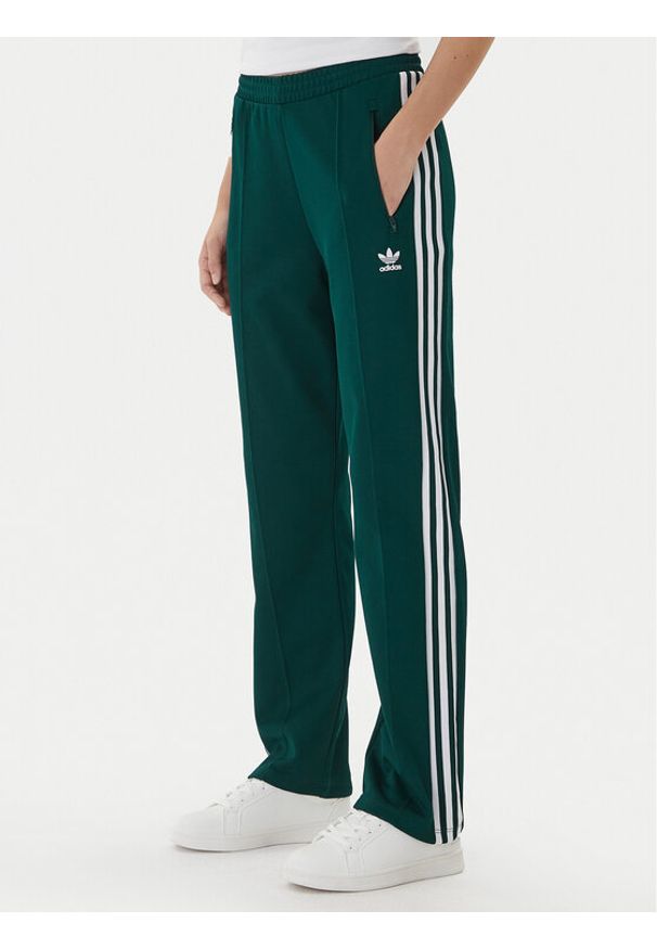 Adidas - adidas Spodnie dresowe Beckenbauer JV7395 Zielony Regular Fit. Kolor: zielony. Materiał: bawełna