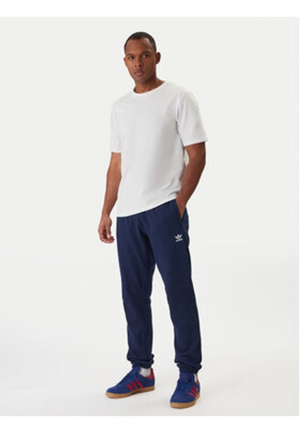 Adidas - adidas Spodnie dresowe Trefoil Essentials JD2423 Granatowy Slim Fit. Kolor: niebieski. Materiał: bawełna