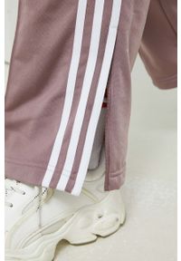 adidas Originals spodnie dresowe damskie kolor fioletowy gładkie. Kolor: fioletowy. Materiał: dresówka. Wzór: gładki #3