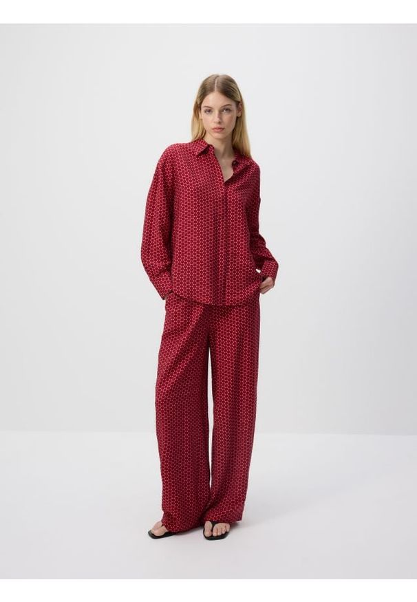 Reserved - Wzorzyste spodnie - różowy. Kolor: różowy. Materiał: wiskoza