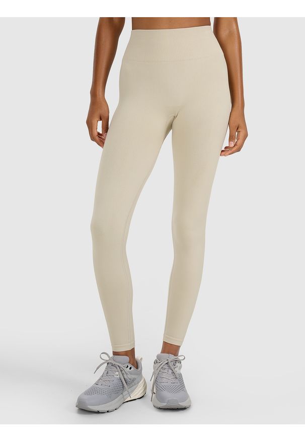 4f - 4F Legginsy treningowe bezszwowe damskie - beżowe M/L. Stan: podwyższony. Kolor: beżowy. Materiał: materiał, elastan, syntetyk, dzianina, włókno. Wzór: ze splotem, gładki. Sport: fitness