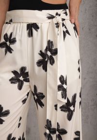Renee - Czarno-Kremowe Szerokie Spodnie High Waist z Kwiatowym Printem i Wiązanym Paskiem Oramare. Okazja: na co dzień. Stan: podwyższony. Kolor: czarny. Długość: krótkie. Wzór: nadruk, kwiaty. Styl: casual, boho #6