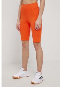 Adidas by Stella McCartney - adidas by Stella McCartney szorty treningowe damskie kolor pomarańczowy gładkie high waist. Stan: podwyższony. Kolor: pomarańczowy. Materiał: skóra, poliester, dzianina, materiał. Wzór: gładki