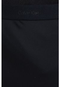 Calvin Klein Spódnica kolor czarny midi rozkloszowana. Kolor: czarny. Materiał: tkanina, poliester. Wzór: gładki #3