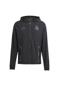 Adidas - Real Madrid Tiro 25 Competition Vis Tech Travel Jacket. Kolor: czarny. Materiał: materiał. Sport: piłka nożna