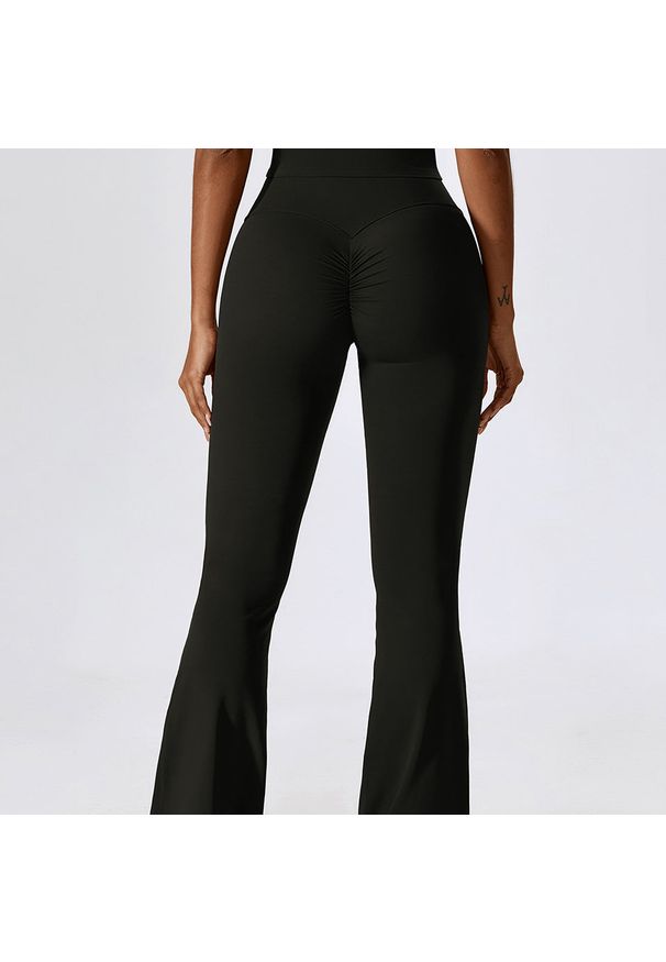 Intica - Spodnie treningowe z elastycznego materiału z wysokim stanem Oksun. Stan: podwyższony. Kolor: pomarańczowy. Materiał: materiał. Sport: fitness