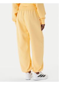 Adidas - adidas Spodnie dresowe Soft Lux KA7020 Pomarańczowy Loose Fit. Kolor: pomarańczowy. Materiał: syntetyk #5