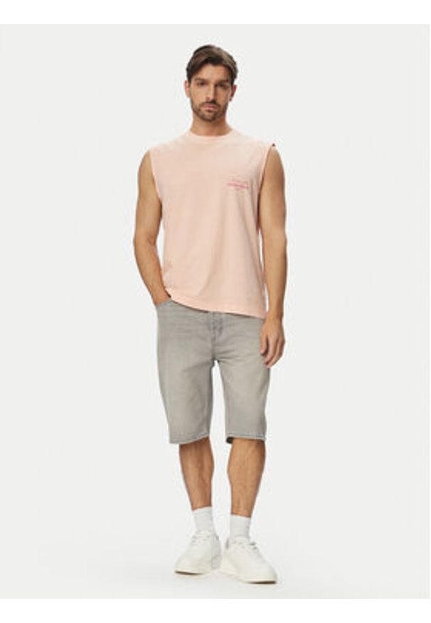 Jack & Jones Tank top Cassis Washed Back 12295076 Pomarańczowy jasny Relaxed Fit. Kolor: pomarańczowy. Materiał: bawełna