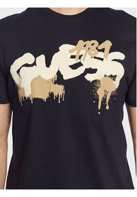 Guess T-Shirt Graffiti Logo M3GI59 K9RM1 Granatowy Slim Fit. Kolor: niebieski. Materiał: bawełna