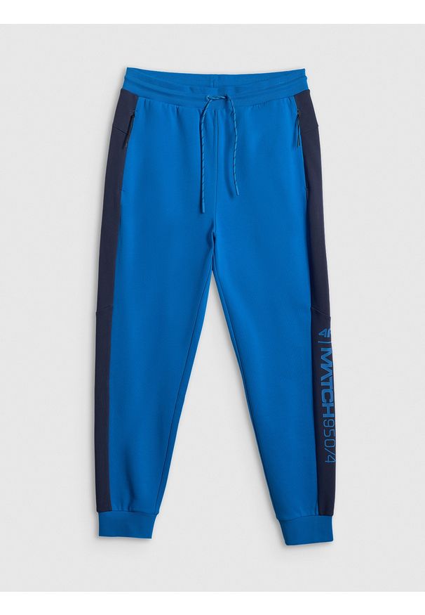 4f - 4F Spodnie dresowe joggery męskie - niebieskie M. Kolor: niebieski. Materiał: dresówka. Sport: fitness