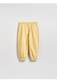 Reserved - Bawełniane spodnie jogger - żółty. Kolor: żółty. Materiał: bawełna #1