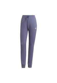 Adidas - Spodnie damskie adidas Essentials French Terry 3-Stripes Pants. Kolor: biały, wielokolorowy, fioletowy. Materiał: dresówka. Długość: długie