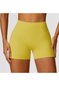 Intica - Spodenki sportowe modelujące z elastycznym pasem do treningu i biegania Essence. Kolor: żółty. Materiał: materiał. Sport: fitness