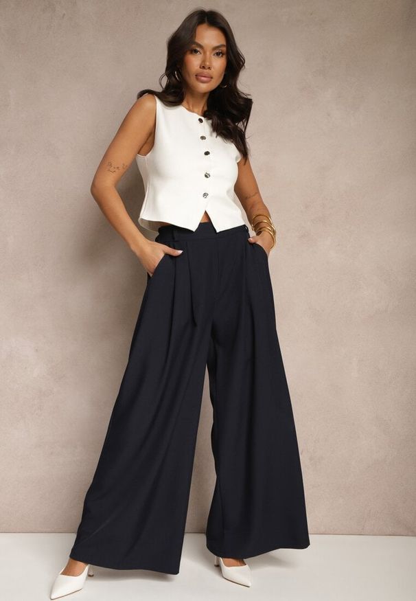 Renee - Granatowe Eleganckie Spodnie Palazzo z Szerokimi Nogawkami Adivisa. Stan: podwyższony. Kolor: niebieski. Styl: elegancki