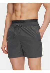 Calvin Klein Swimwear Szorty kąpielowe KM0KM01104 Szary Regular Fit. Kolor: szary. Materiał: syntetyk