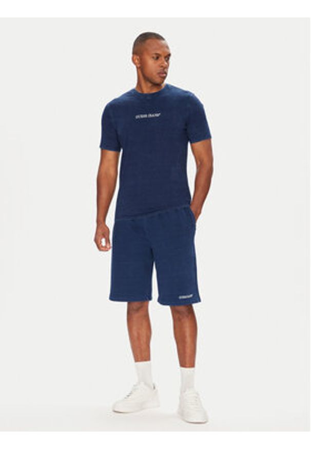 Guess Jeans T-Shirt M5YI34 KCTG1 Niebieski Slim Fit. Kolor: niebieski. Materiał: bawełna