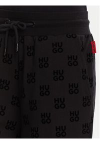 Hugo - HUGO Spodnie dresowe Flokki 50531676 Czarny Relaxed Fit. Kolor: czarny. Materiał: dresówka, bawełna