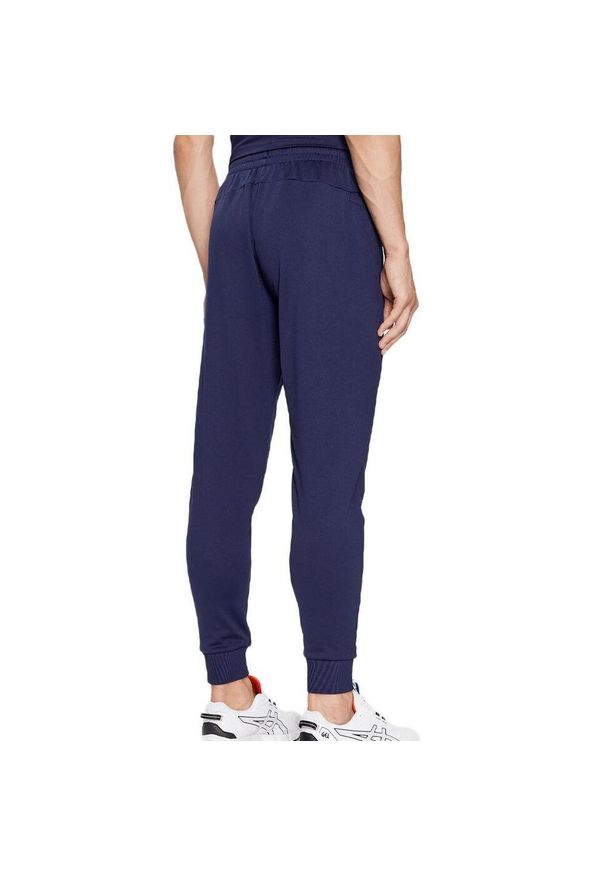 Spodnie treningowe męskie Under Armour 1373362410. Kolor: niebieski. Materiał: dresówka. Sport: bieganie