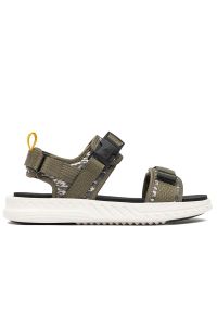 Sandały New Balance SMA600B2 - zielone. Zapięcie: rzepy. Kolor: zielony. Materiał: guma, tworzywo sztuczne, materiał, syntetyk. Wzór: paski. Styl: klasyczny