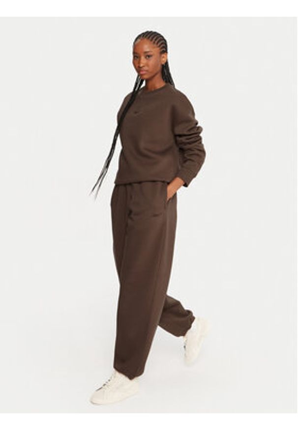 Reebok Spodnie dresowe Reebok X Ewa Chodakowska RK25304CCW Brązowy Regular Fit. Kolor: brązowy. Materiał: syntetyk, bawełna