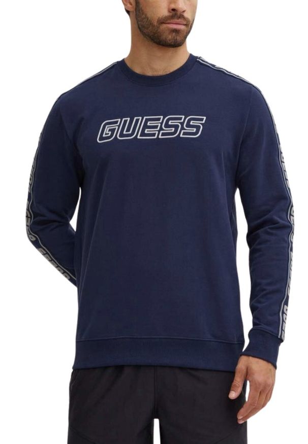 Guess - GUESS Granatowa męska bluza z lampasami Arlo Cn. Okazja: do domu, na co dzień. Kolor: niebieski. Materiał: bawełna, elastan. Długość rękawa: długi rękaw. Długość: długie. Styl: casual