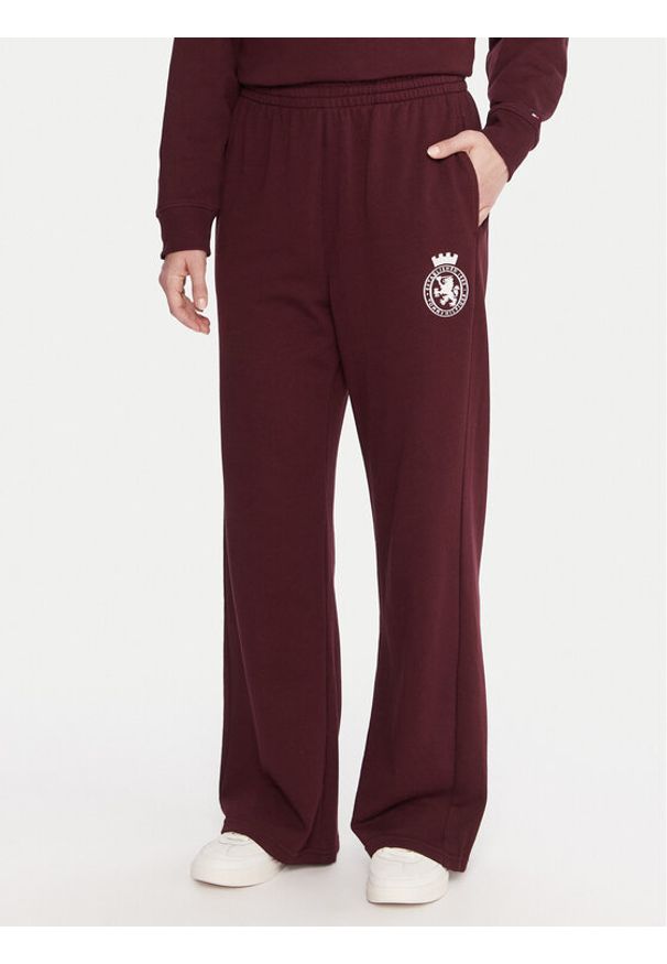 TOMMY HILFIGER - Tommy Hilfiger Spodnie dresowe UW0UW06081 Bordowy Wide Leg. Kolor: czerwony. Materiał: bawełna
