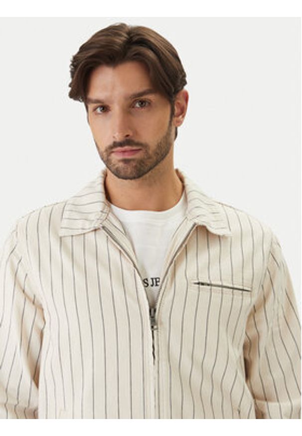 Guess Jeans Kurtka jeansowa M6GN70 D7961 Beżowy Regular Fit. Kolor: beżowy. Materiał: bawełna