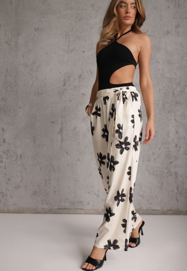 Renee - Czarno-Kremowe Szerokie Spodnie High Waist z Kwiatowym Printem i Wiązanym Paskiem Oramare. Okazja: na co dzień. Stan: podwyższony. Kolor: czarny. Długość: krótkie. Wzór: nadruk, kwiaty. Styl: boho, casual