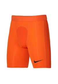 Nike - Męskie Spodenki Kompresyjne Pro Strike DriFIT. Kolor: pomarańczowy, wielokolorowy, żółty. Sport: turystyka piesza