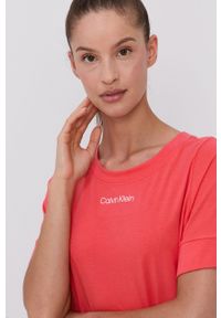 Calvin Klein Underwear - Koszula nocna. Kolor: pomarańczowy. Materiał: dzianina. Długość: krótkie. Wzór: nadruk