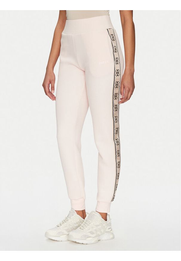 Guess Spodnie dresowe V2YB15 KB3P2 Różowy Regular Fit. Kolor: różowy. Materiał: syntetyk, bawełna
