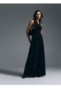 Reserved - Kombinezon z szerokimi nogawkami - czarny. Kolor: czarny. Materiał: dzianina. Wzór: gładki #1