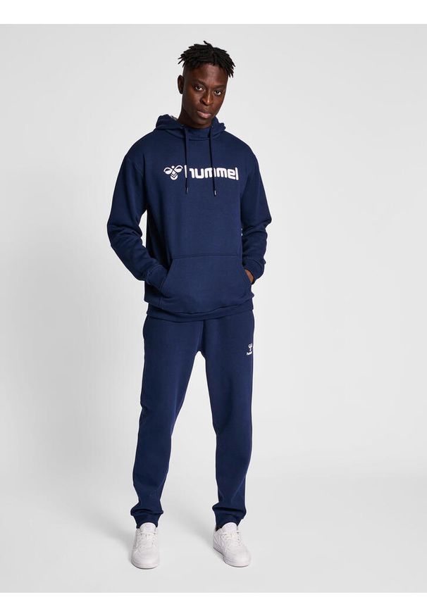 Bawełniana bluza z kapturem Hummel Mover. Typ kołnierza: kaptur. Kolor: niebieski. Materiał: bawełna. Sport: fitness