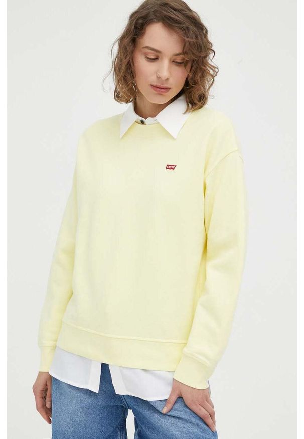 Levi's® - Levi's bluza bawełniana damska kolor żółty z aplikacją. Okazja: na spotkanie biznesowe. Kolor: żółty. Materiał: bawełna. Długość rękawa: długi rękaw. Długość: długie. Wzór: aplikacja. Styl: biznesowy, klasyczny