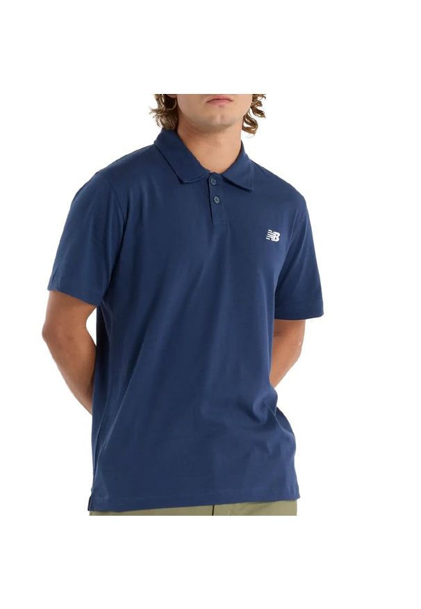 Koszulka męska New Balance MT51504NNY - granatowa. Typ kołnierza: polo. Kolor: niebieski. Materiał: bawełna, materiał