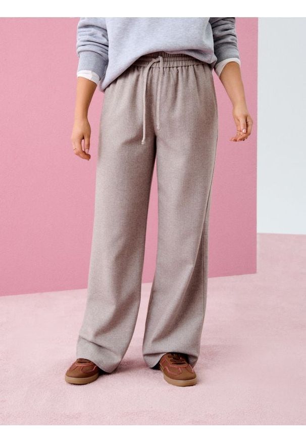 Sinsay - Spodnie wide leg - beżowy. Kolor: beżowy