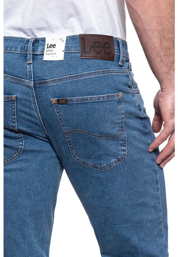 Lee - LEE DAREN ZIP FLY MĘSKIE SPODNIE JEANSOWE MID STONE L707SQ44 112142543