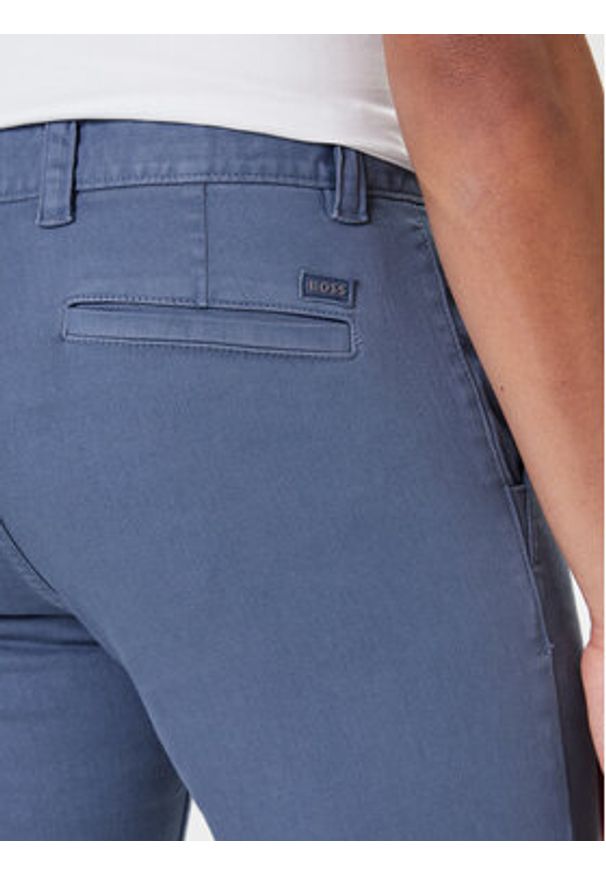 BOSS Chinosy 50547865 Niebieski Slim Fit. Kolor: niebieski. Materiał: bawełna