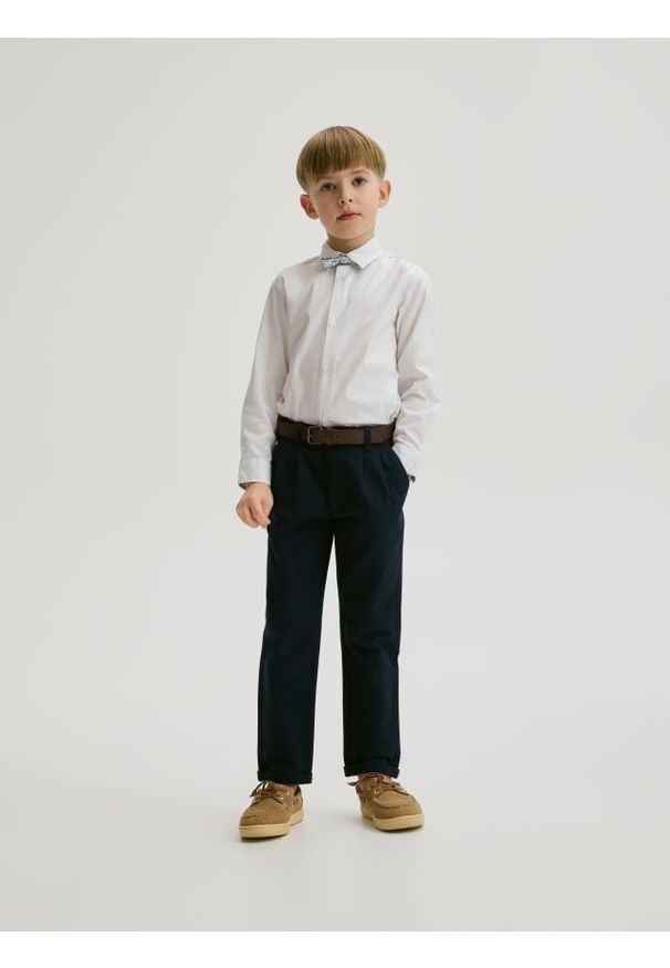 Reserved - Spodnie chino - granatowy. Kolor: niebieski. Materiał: tkanina, bawełna