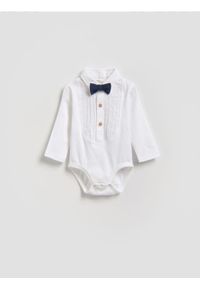 Reserved - Eleganckie body z muchą - biały. Kolor: biały. Materiał: dzianina, bawełna #1