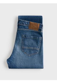 Reserved - Jeansy straight z efektem sprania - niebieski. Kolor: niebieski #1
