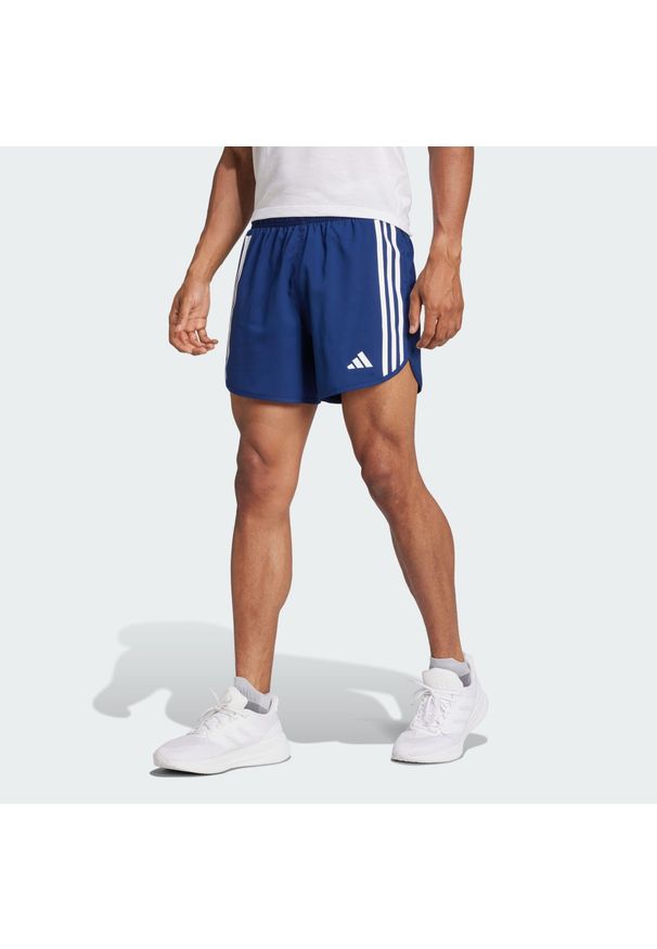 Adidas - Szorty Own the Run 3-Stripes. Kolor: niebieski. Materiał: materiał. Sport: bieganie