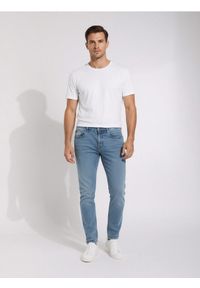 Sinsay - Jeansy chino slim fit - niebieski. Kolor: niebieski. Materiał: jeans #1